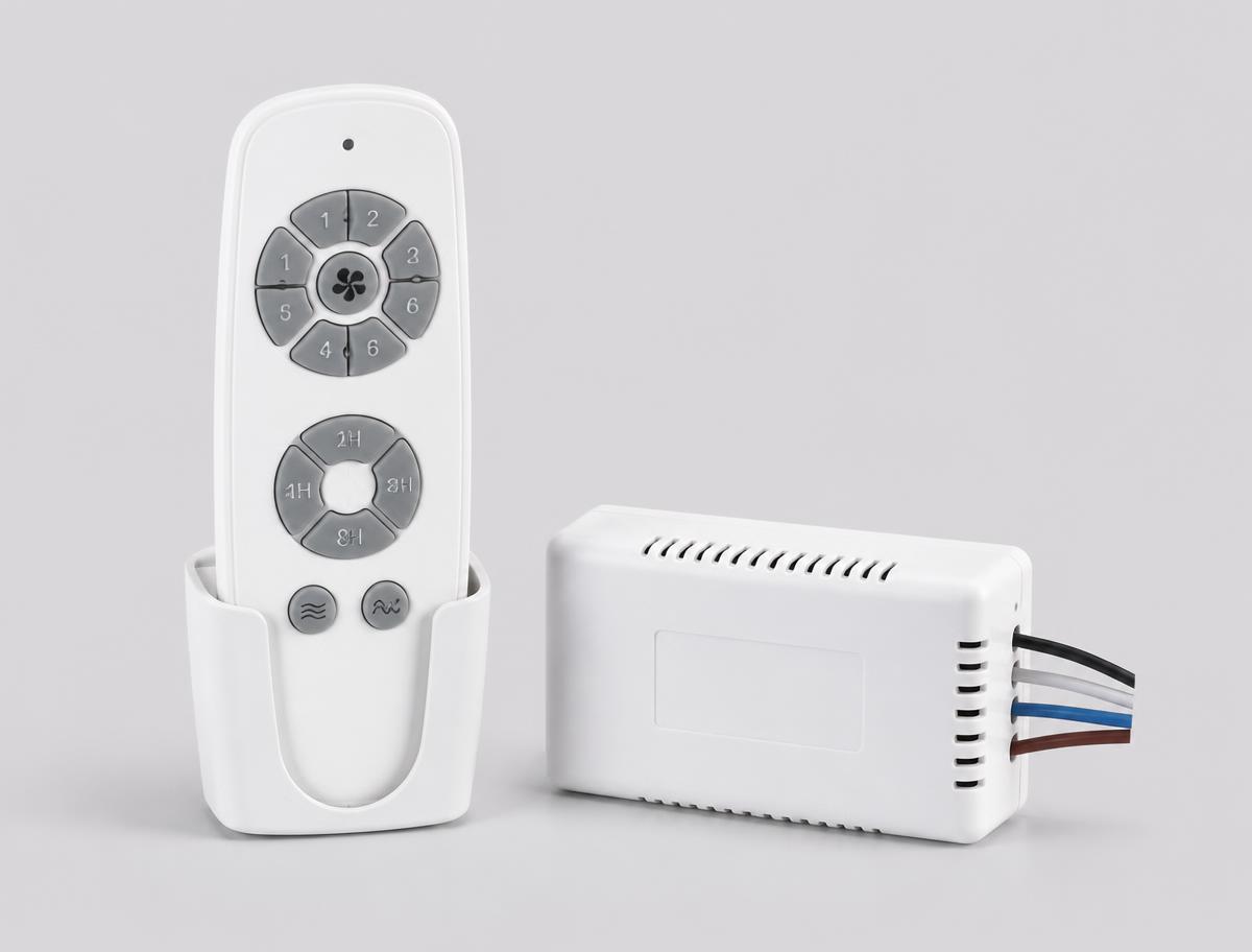 Hand holding a small white wireless fan speed remote control in a modern hallway